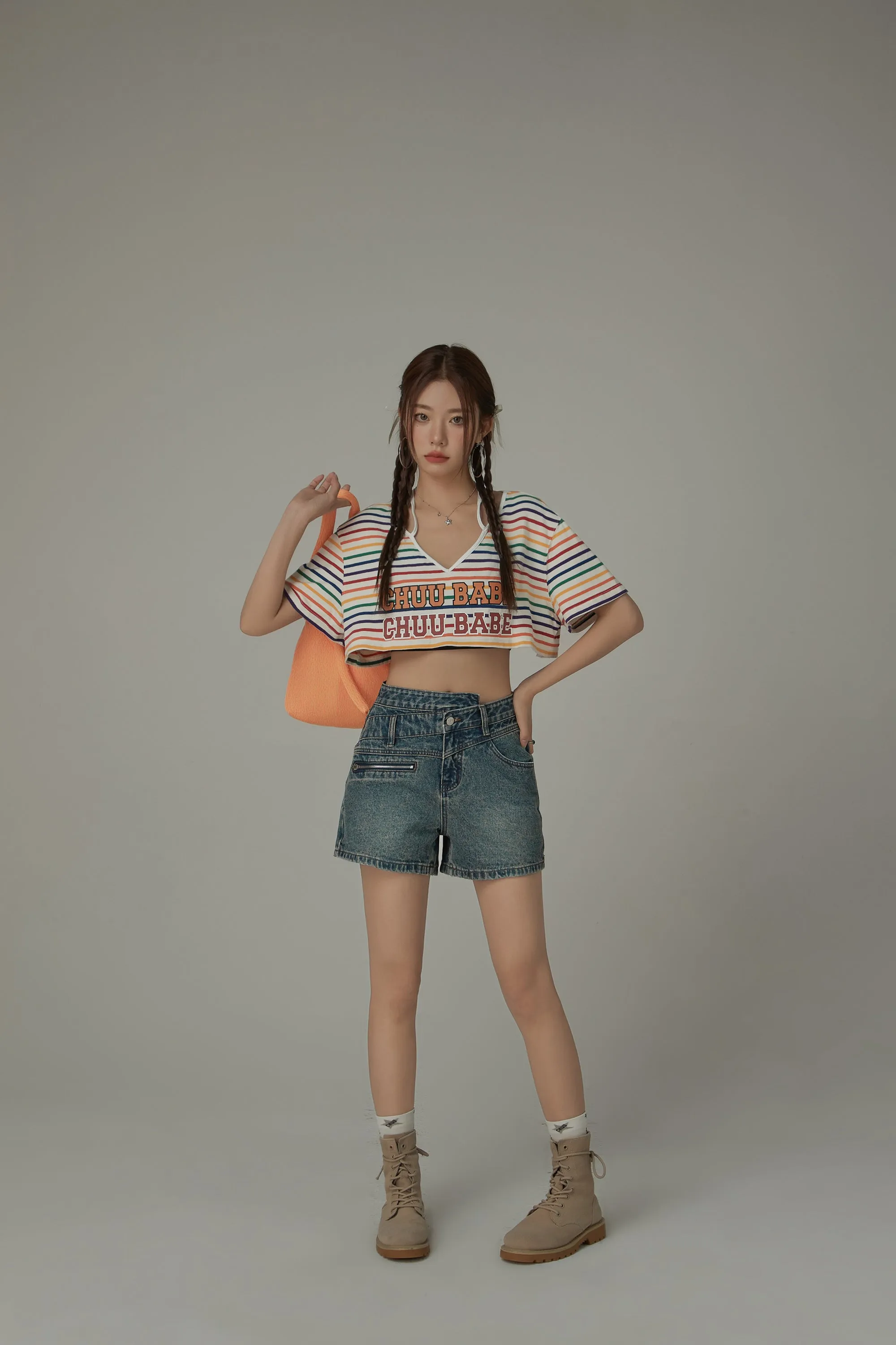 Asymmetrical Button Distressed Denim Shorts