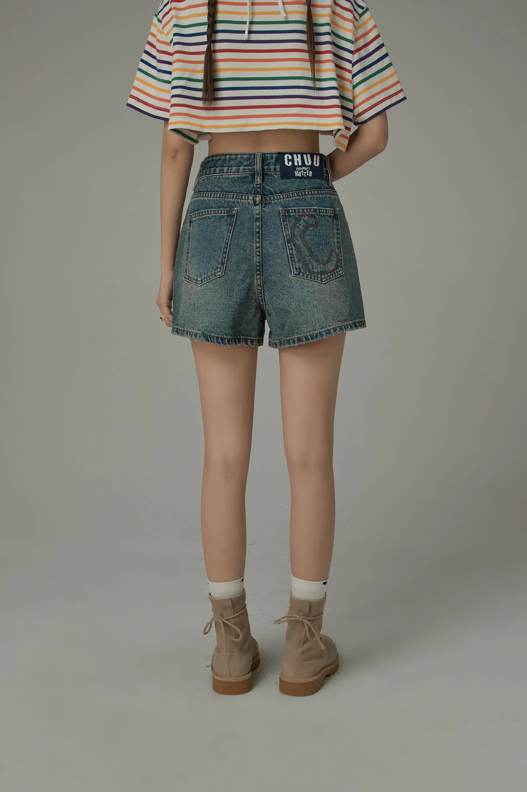 Asymmetrical Button Distressed Denim Shorts